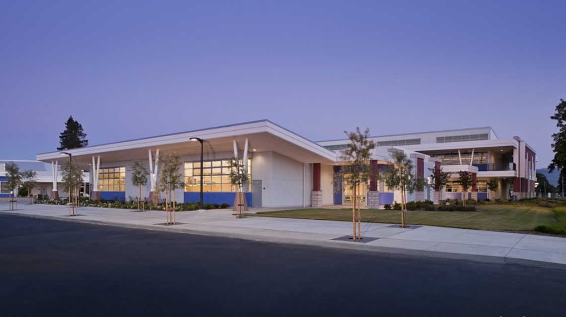 Visual Arts Building-Sublin High School-at dusk withthe building's exterior surface and interior space illuminated.